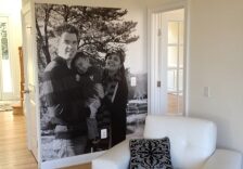 black and white family photo mural in famil room living room 224x156