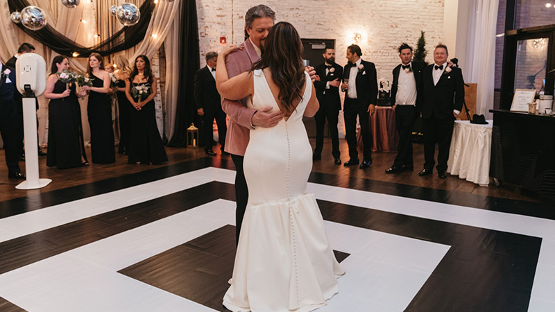 Black and white concentric squares we printed on this dance floor wrap to give the wedding venue a very sophisticated look.