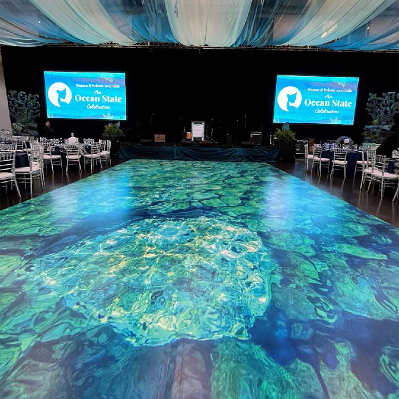 When your company's name is Ocean State, it makes sense to have a vinyl dance floor wrap that makes it appear as if you're dancing on top of the water, as if on a glass bottom boat.