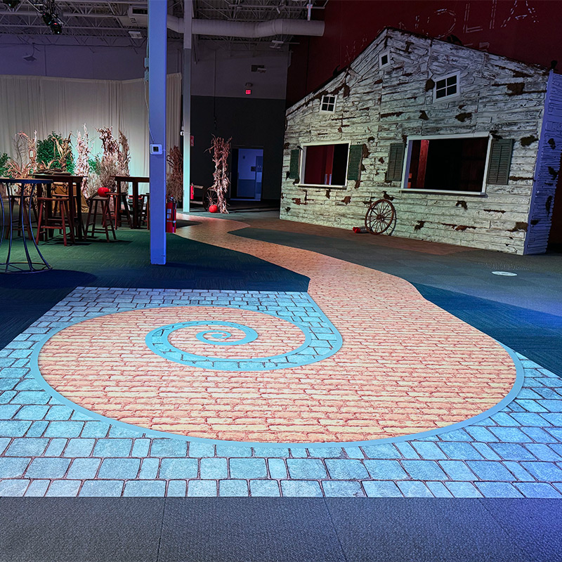 At a corporate event with a "Wizard of Oz," theme, much of the floor, tiled as well as carpeted, was covered with a custom-printed wrap that looked like the yellow brick road.