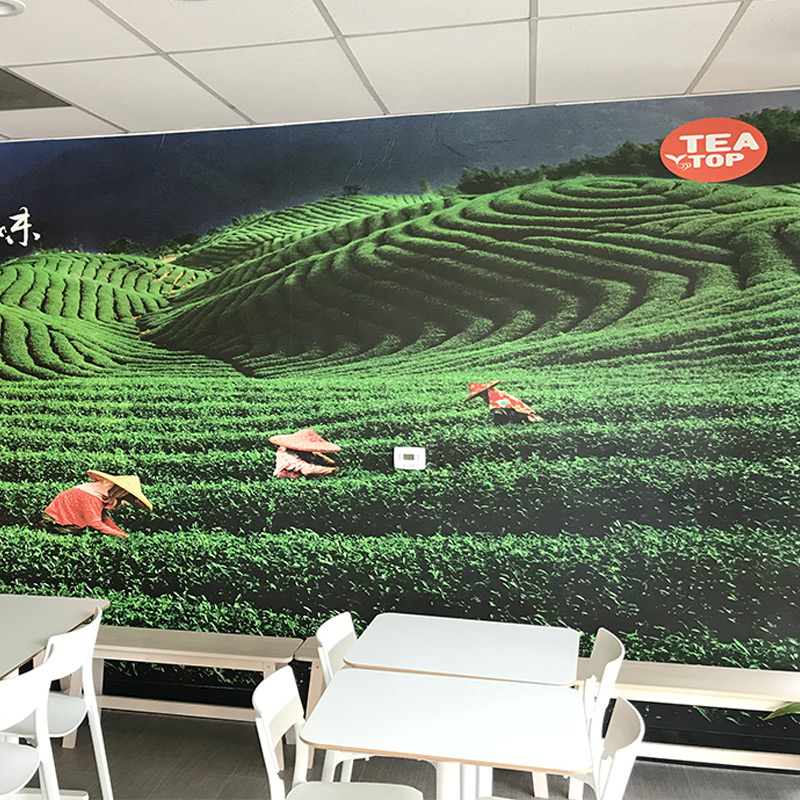 The focal point of the Tea Top café in San Jose, CA is a wallpaper mural of the rolling terraced fields of a tea plantation in Taiwan, the home of the restaurants founder. The green farmland is perfect to this garden fresh restaurant.