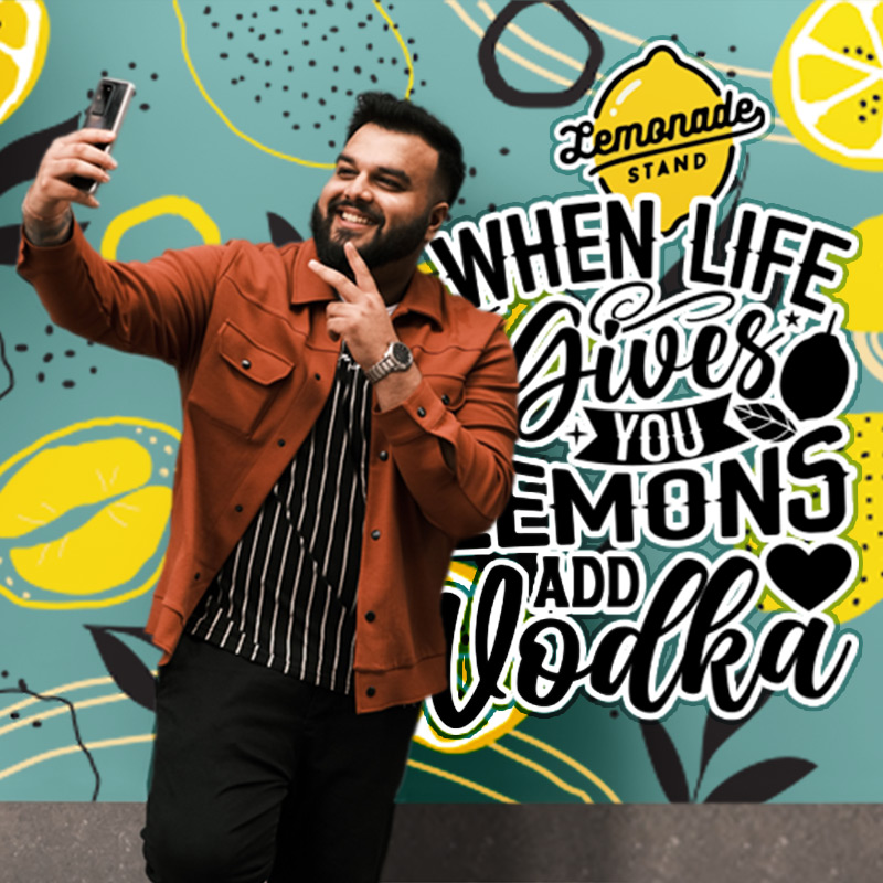 A fun restaurant-branded wallpaper mural can not only help draw in diners from the street and create a cool and energetic vibe, but it can also serve as a backdrop for your customers to take those all-important selfies.