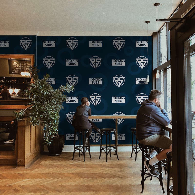 Take-away restaurants have minutes to get their branding efforts noticed. A step-and-repeat wallpaper featuring your name and logo is an awesome way to get your name out there, decorate uniquely, and make sure that your restaurant is easily identified.