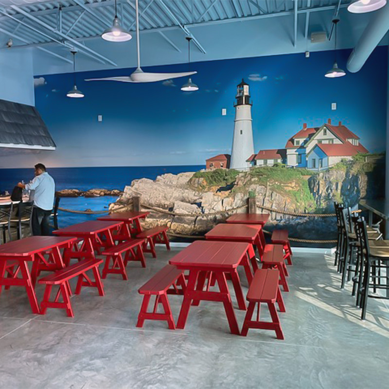 Chef Bob's Lobstah Trap in Colorado Springs wanted to create a “wharfside lobster shack feeling like you'd find in New England,” when he renovated his restaurant. He did just that with one of our wallpaper murals featuring the Portland Head Lighthouse.