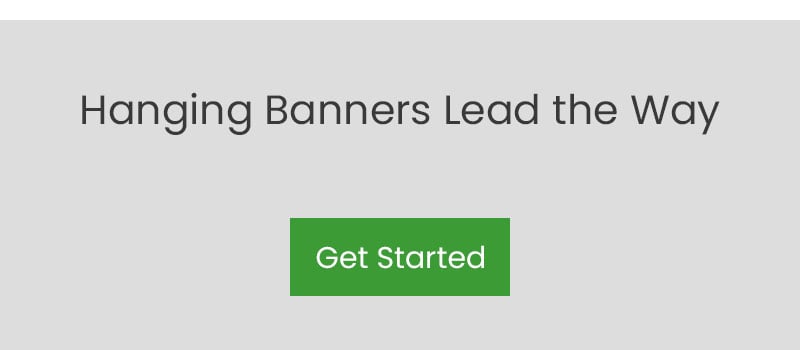 hanging banners from fences, building exteriors, flag poles, interior make a huge impact