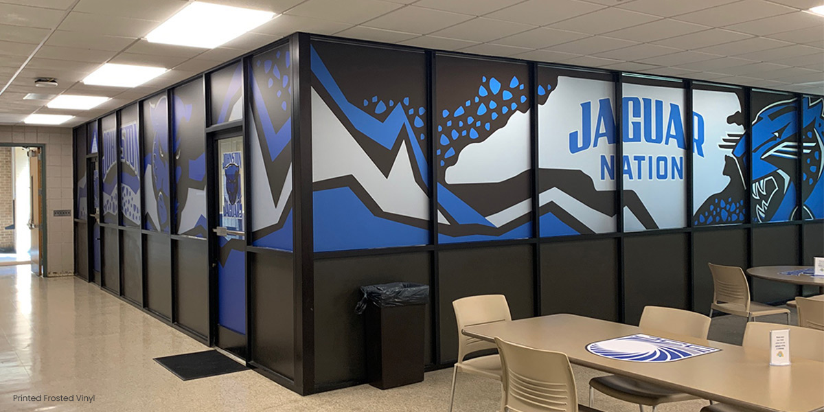 When a glass enclosed office space in a school building needs to increase the level of privacy, opaque window graphics, printed and/or frosted window films come to the rescue. These vibrant window graphics provide privacy & greatly increase school spirit.