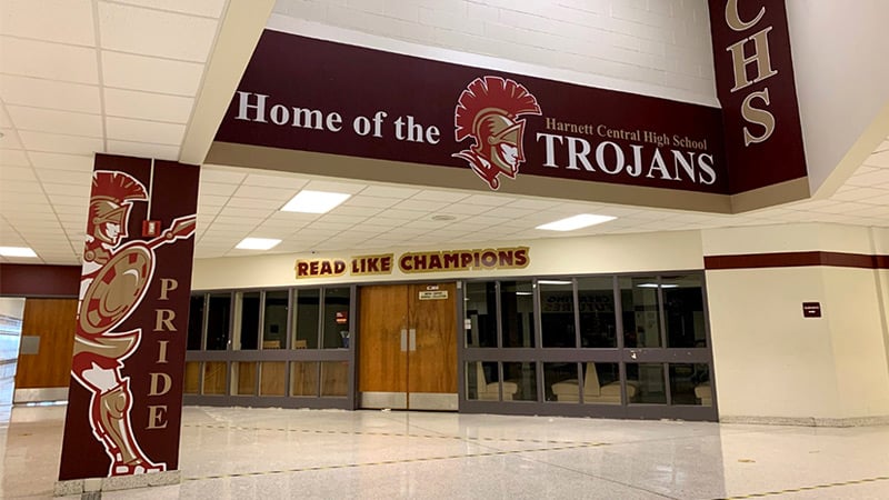 Harnett Central High School takes school spirit all of the way by wrapping bulkheads, columns and door surrounds with the school’s mascot and logos. Wraps and murals make a school look good and make students feel good.
