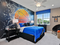 powerful basketball graphic mural in boy or teen's bedroom with black and blue accent décor