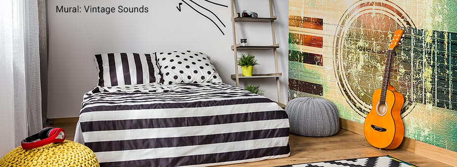 This teen's bedroom is decorated with a wallpaper mural that gives the kid the grunge/music themed artwork he wants while giving the mom the sophisticated touch she wants. We have thousand of murals designed to appeal to teenagers and parents alike.