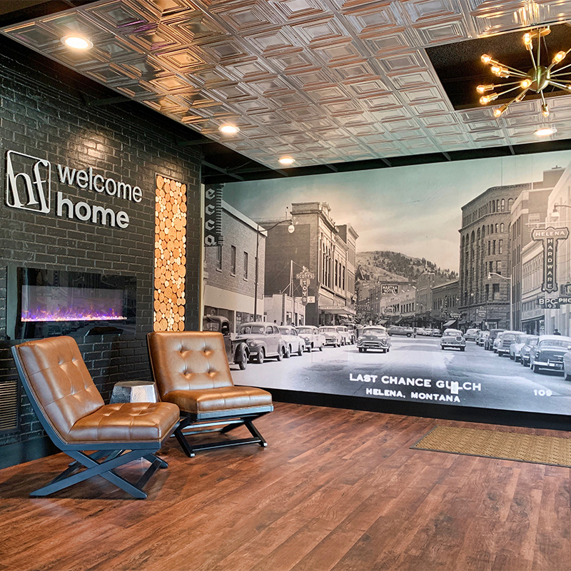 The lobby of the Echo Church at the Helena First Assembly of God in Montana celebrates the town that they and their worshippers call home with a large wall mural made out of a vintage photo of downtown Helena in the 1940s.