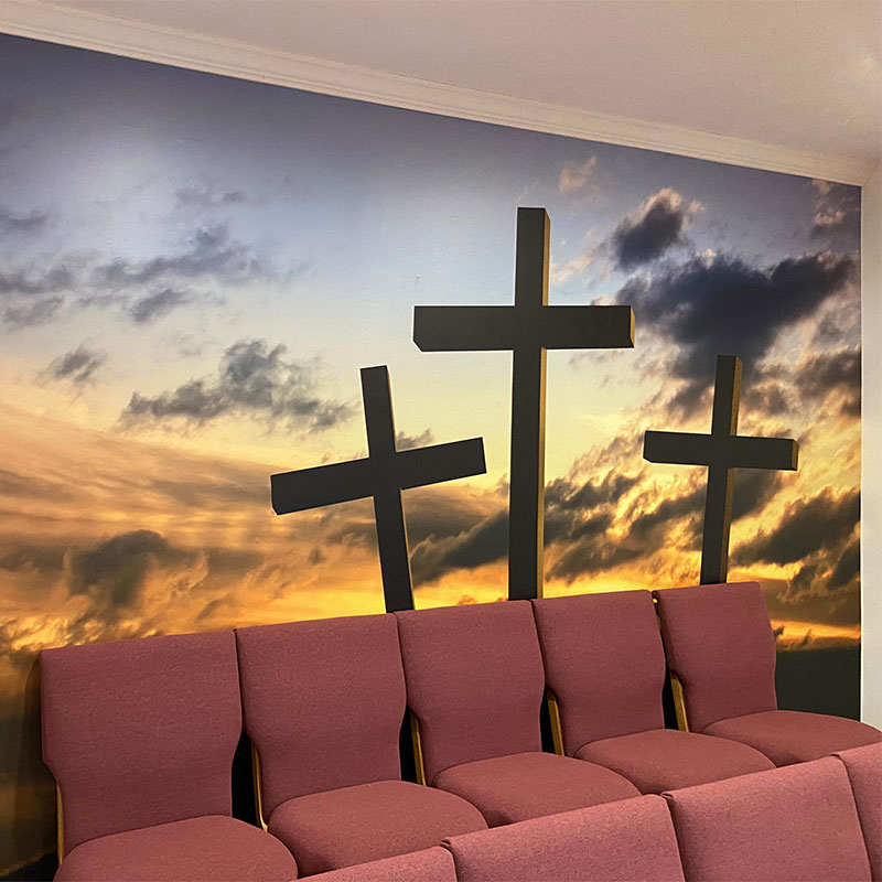 Our "Three Crosses" mural representing the crucifixion of Jesus Christ at Calvary adorns a back wall of a small conference room at the Laural Fork Missionary Baptist Church in West Virginia.