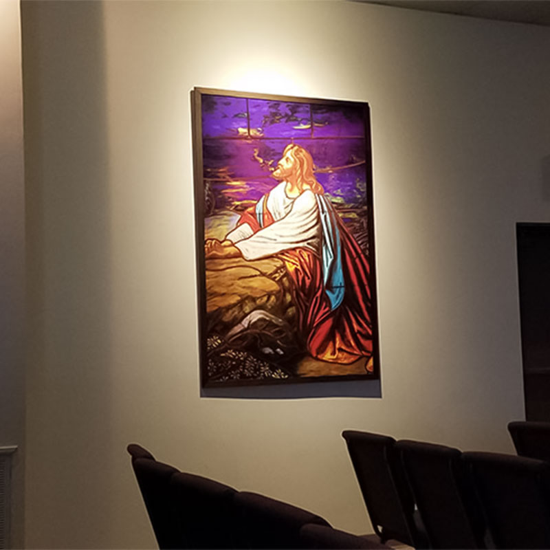 A stained glass image of "Jesus Praying" was turned into a wallpaper mural and given a frame to really finish it nicely at the New Home united Methodist Church of Christ.