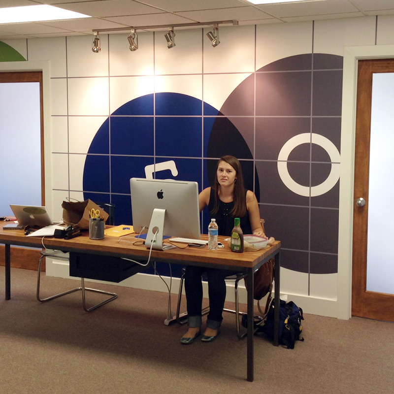 A bold graphic mural in a real estate office.