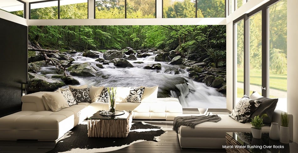 modern living room full of windows bringing nature in alongside the water-sweeping waterfall scene wallpaper